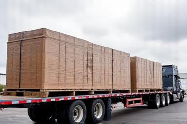 Step deck trailer for versatile machinery hauling